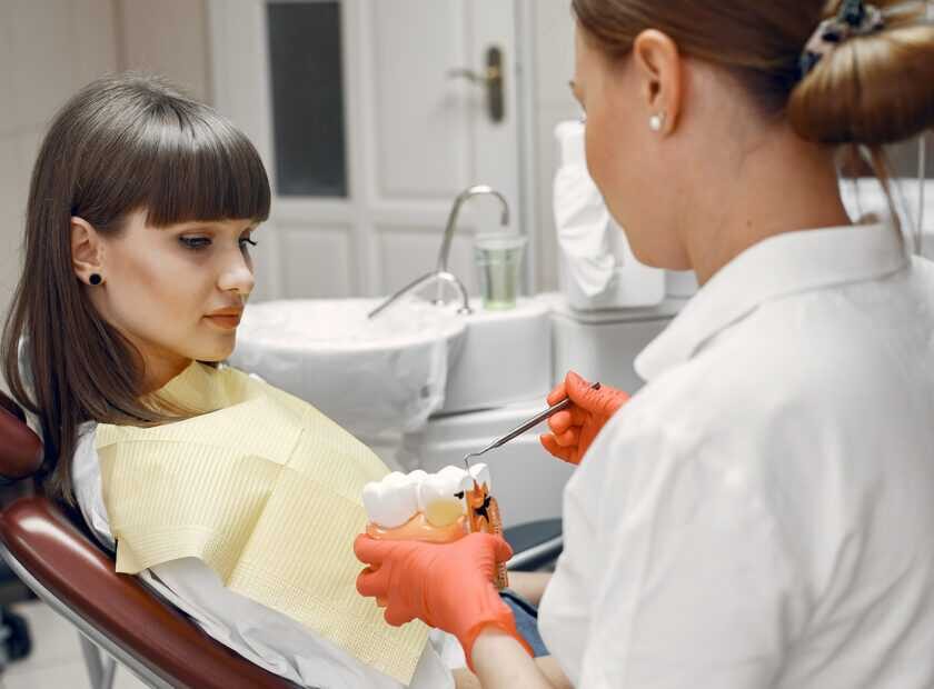 Young woman at the dentist's reception